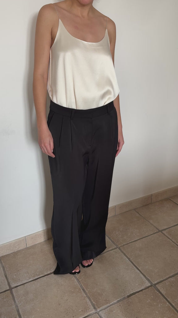 Aria Two Tuck Pants in Black by OEA PARIS